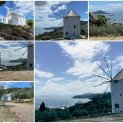 在希臘風車的旁邊騎掃把拍照